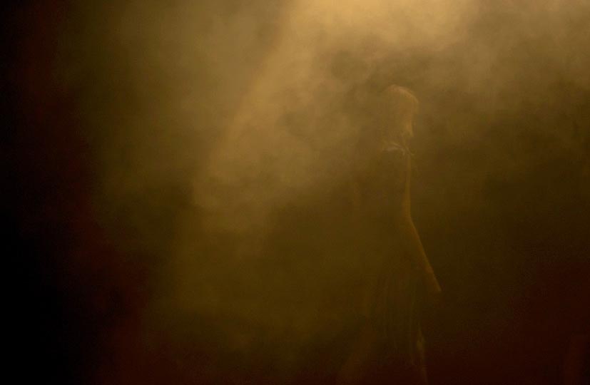 photo by photographer danny roberts of a girl walking through a a mysterious foggy scene in A degree Fahrenheit runway show in tokyo fashion week spring 2012