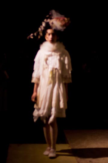 Artist Danny Roberts ghostly out of focus picture of a mori girl wearing flowers in her hair and white dress in furfur spring 2012 collection tokyo fashion week
