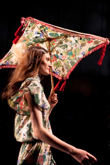 Danny Roberts Picture of a women Model holding a red umbrella and an ornate japanese dress in Keita Maruyama Spring fashion show for tokyo fashion week 2012