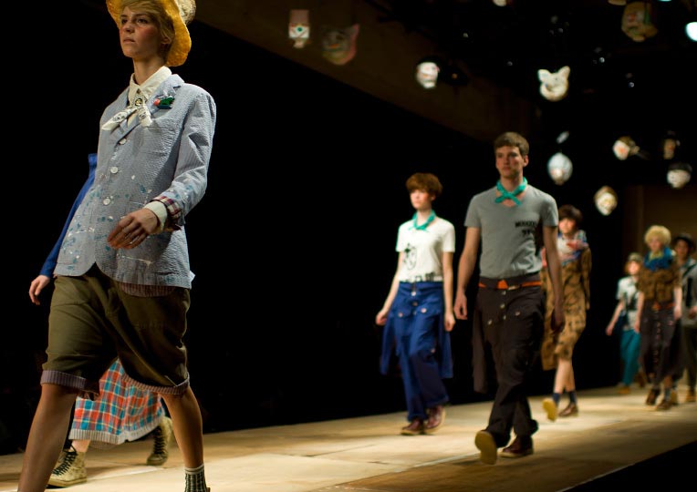 A horizontal picture of hand full of guys and girls walking down the runday during Ne-nets show at Tokyo Fashion Week spring 2012 Photo by Artist Danny Roberts
