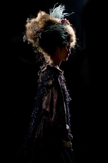 Black silhouette of a female model in mori girl forest like outfit for Vantan art and design School Senior Collection in Tokyo Fashion Week Spring 2012